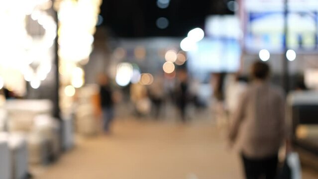 Abstract background blurred many people in the exhibition expo event or trade fair