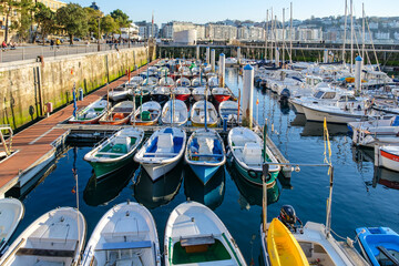 Fototapeta premium Harbor with boats in San Sebastian, Spain