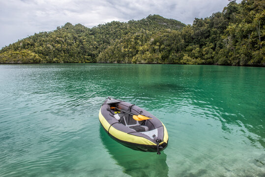 Empty Inflatable rubber dinghy in ocean, Raja Ampat, West Papua, Indonesia