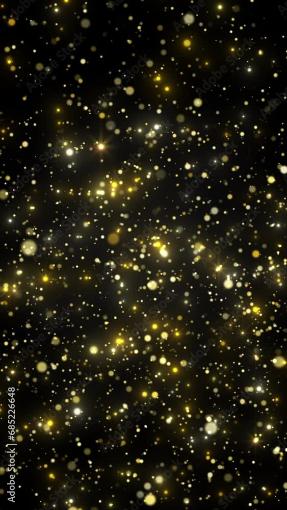 Poster vertical video animation of golden glitter particles - particles of rain with defocused bokeh. abstr