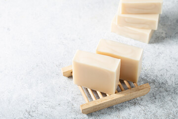 Set of natural handicraft soap bars on white background