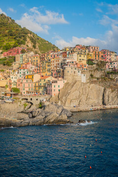 Village of Marola with colorful houses on hill on the Mediterranean Sea, famous Cinque Terre ITALY