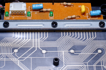 Computer keyboard board with radio components close-up
