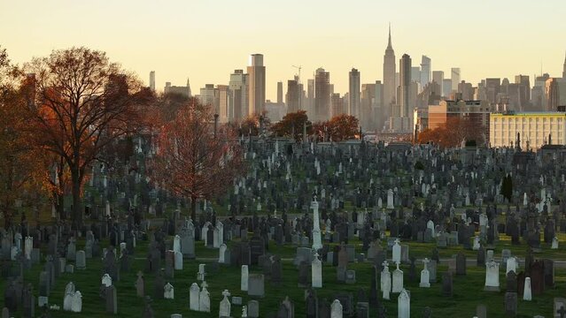 Drone footage of an empty cemetery in New York City. Shot during an autumn sunset in 4k.