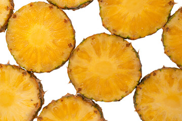 Pineapple juicy yellow slices on a white background.