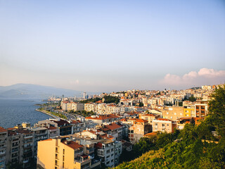 Apartment buildings on the shore of Aegean Sea during the sunset, Izmir, Turkey