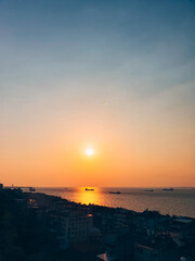 Apartment buildings on the shore of Aegean Sea during the sunset, Izmir, Turkey