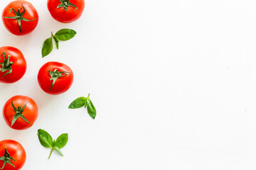 Fresh tomatoes and basil - food pattern. Cooking background