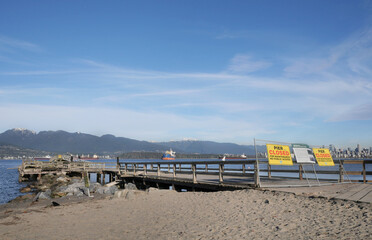 Jericho Pier under construction with the skyline of Vancouver in the background at Jericho Beach in Vancouver, British Columbia, Canada