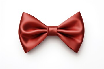 A red bow tie on a white surface