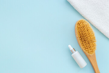 Massage and bath brush with towel. Spa set concept