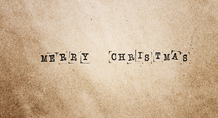 Printed text, Merry Christmas, on vintage paper, scrapbooking, typewriter text, typewritten text, top view,