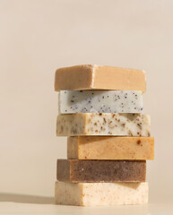Beige handmade soap bars on light beige close up. Natural hygiene product