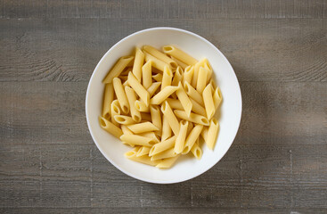 bowl of boiled pasta penne