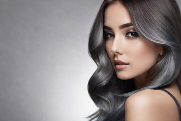 A gorgeous young girl's hair is dyed in a Ombre style, in the style of anthracite, gradient. Close Up of Hairstyle. Care and Hair Products.