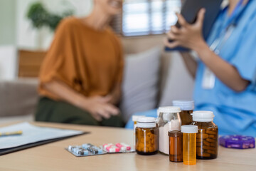 medicine on table and patient and doctor were talking in background