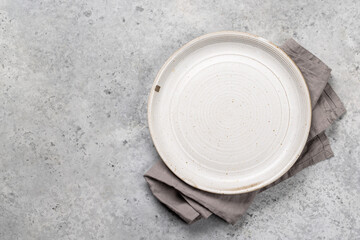 Mockup for a delicious meal. Empty plate on a table