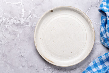 Mockup for a delicious meal. Empty plate on a table