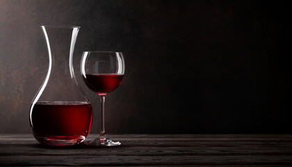 Wine decanter and glass of red wine