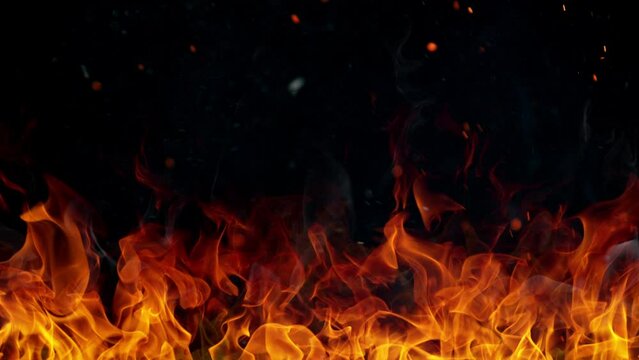 Super slow motion of fire flames isolated on black background. Filmed on high speed cinema camera at 1000 fps