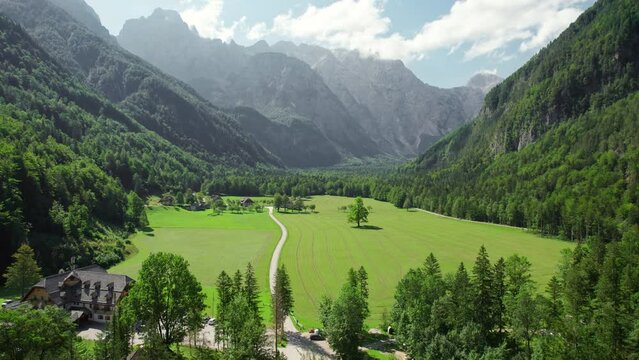 Aerial view of a rural road in alpine scenery of Logar valley, Slovenia