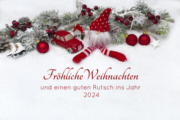 Weihnachtskarte: Winterliche Kulisse mit  roten Weihnachtskugeln, Tannenzweigen und Weihnachtsdeko...