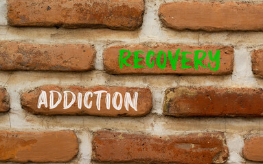 Addiction recovery symbol. Concept words Addiction recovery on beautiful brown brick wall....