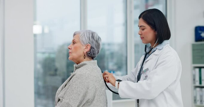 Senior woman, doctor and stethoscope on back to listen to lungs for breathing test. Elderly, medical professional and person with cardiology tools for exam, consultation or healthcare in hospital