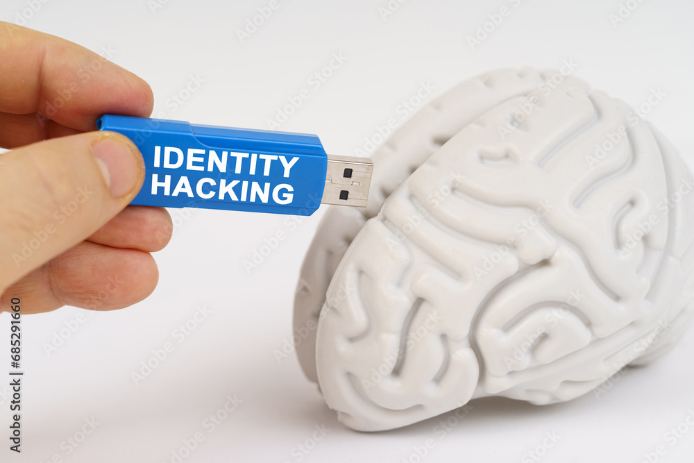 Poster a man inserts a flash drive into his brain with the inscription - identity hacking