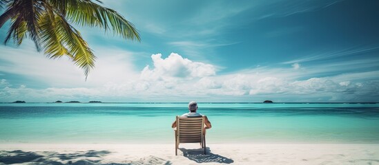 Oceanfront relaxation on Maldives island copy space image - obrazy, fototapety, plakaty