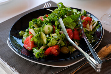 close-up photo of fresh salad with vegetables in white plate