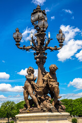 Bronze sculpture on the Bridge Pont Alexandre III in Paris, France