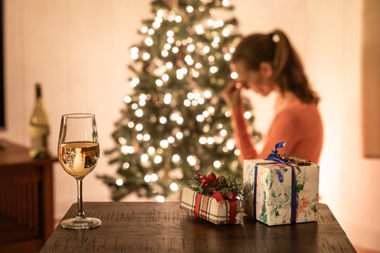 Sad woman home alone during Christmas holidays 