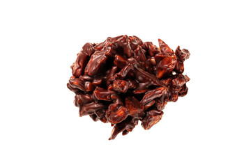Confectionery of a dark chocolate and almond bonbon showing color and texture on a white background.