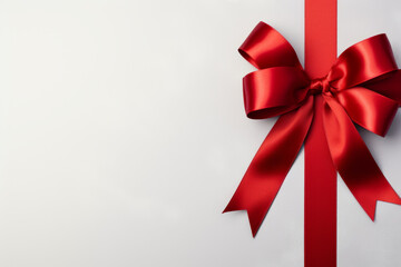 Red gift ribbon with a bow against a gray background. Generative Ai