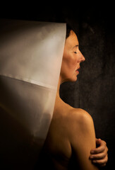 woman in white paper hood II