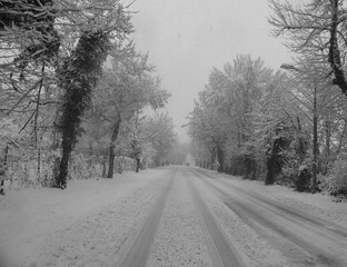 snowy road after the snowfall in the city and disruption to road traffic