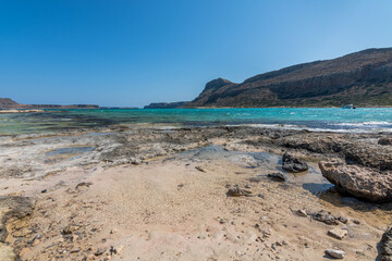 Panorama of the sea and the rock during a windy day at Blue lagoon in Balos, Crete, Greece. Beautiful lagoon at Mediterranean Sea. Shot taken near Gramvousa Island.