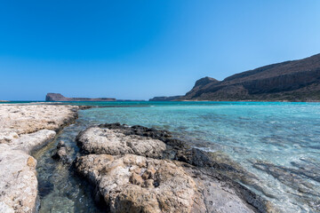 Panorama of the sea and the rock during a windy day at Blue lagoon in Balos, Crete, Greece. Beautiful lagoon at Mediterranean Sea. Shot taken near Gramvousa Island.