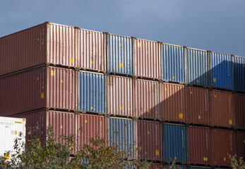 old blue and brown shipping containers