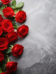 Red roses on white marble background with copy space