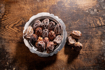 Dried persimmons on wooden table