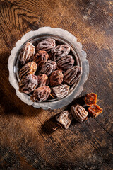 Dried persimmons on wooden table