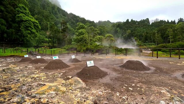 Furnas, Azores; 27th March 2023: Geysers where the stew (Cozinhou) is cooked in the ground in the hot water inside the geysers in a hole, and lots of fumes