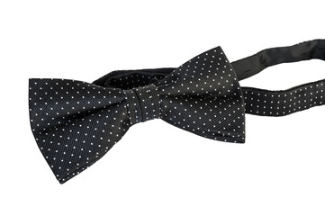Removed bow tie after use isolated on white background. Elegant men's polka dot bow tie.