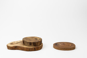 Wooden podium on isolated white background for cosmetic products or food. Mockup