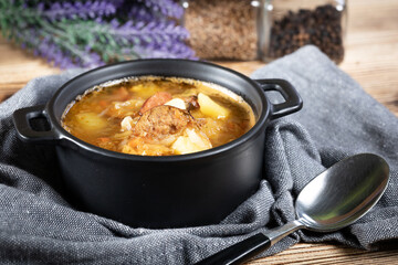 Traditional russian sour cabbage soup