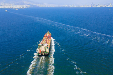 Cargo container Ship, cargo maritime ship with contrail in sea ship carrying containers, freight...