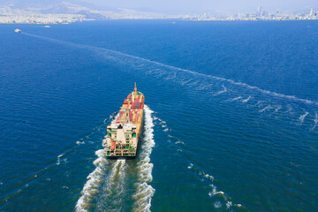 Cargo container Ship, cargo maritime ship with contrail in sea ship carrying containers, freight...