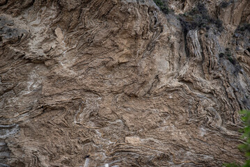exposed geological sedimentary rock background on cliff side